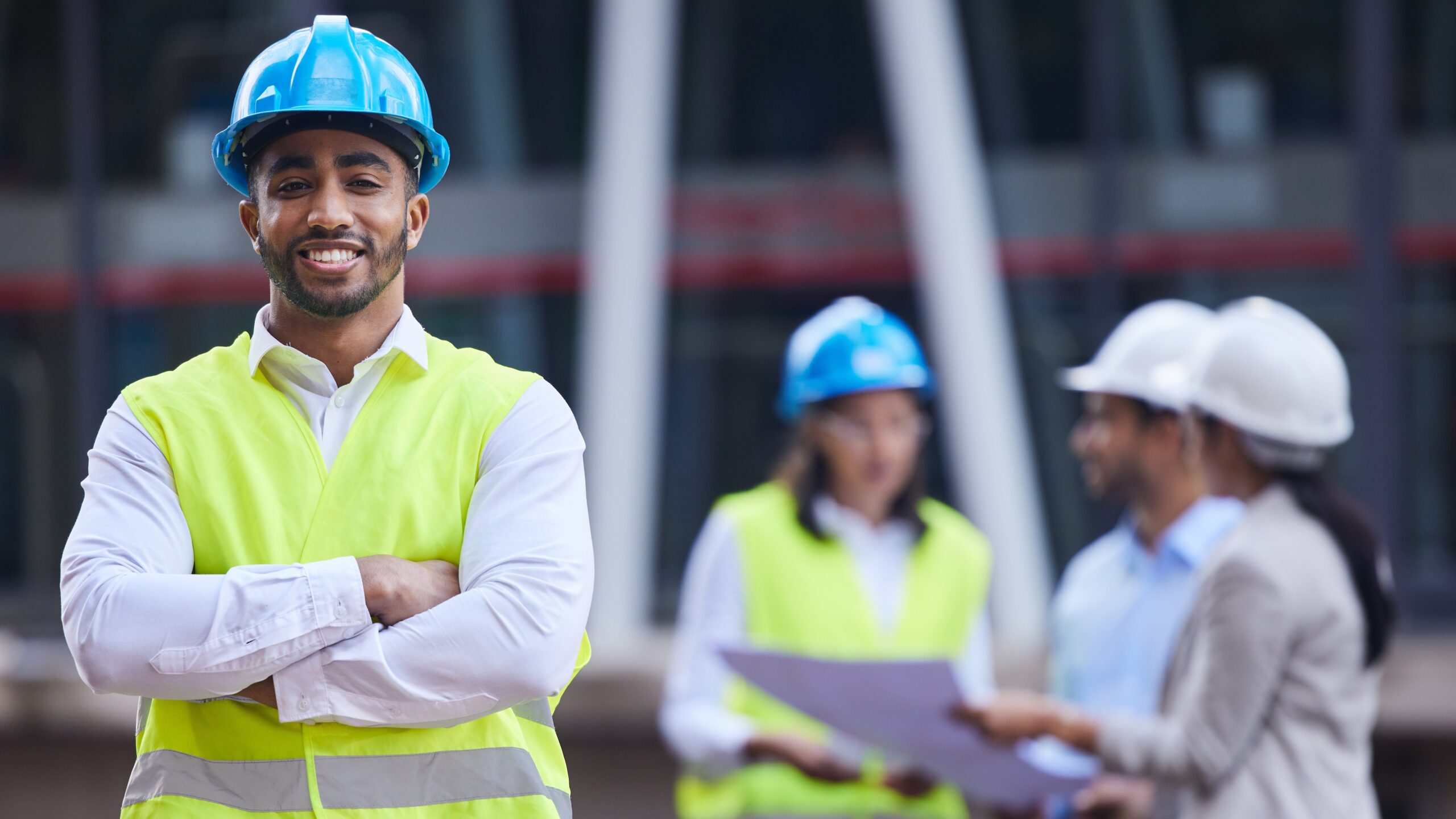 Safety professional smiling who has an EHS certification.