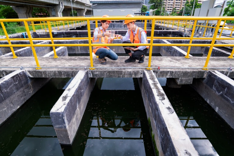 chemicals for wastewater treatment - engineer-take-water-from-wastewater-treatment-pond-2025-04-02-19-09-14-utc