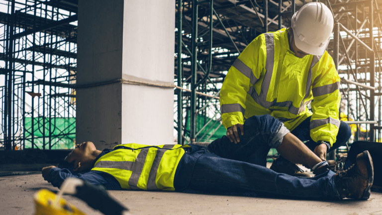 Construction worker performing accident investigation and analysis after a coworker falls and is injured on a job site.