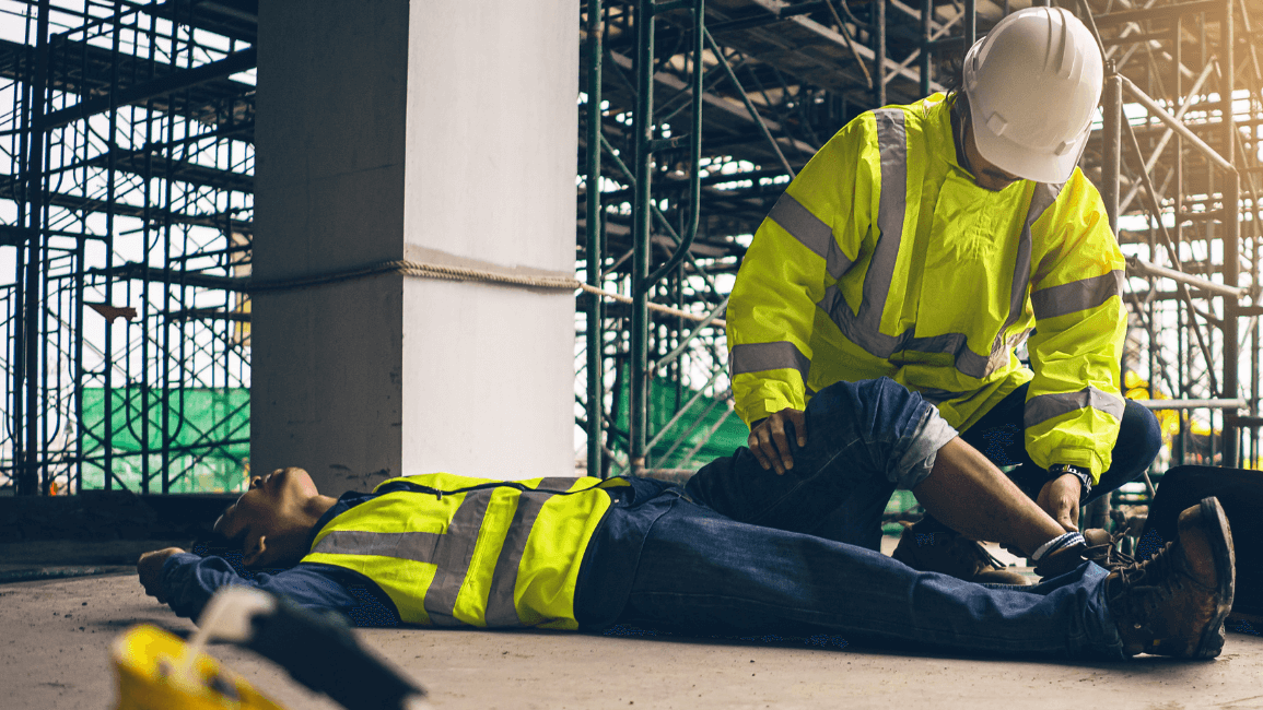 Construction worker performing accident investigation and analysis after a coworker falls and is injured on a job site.