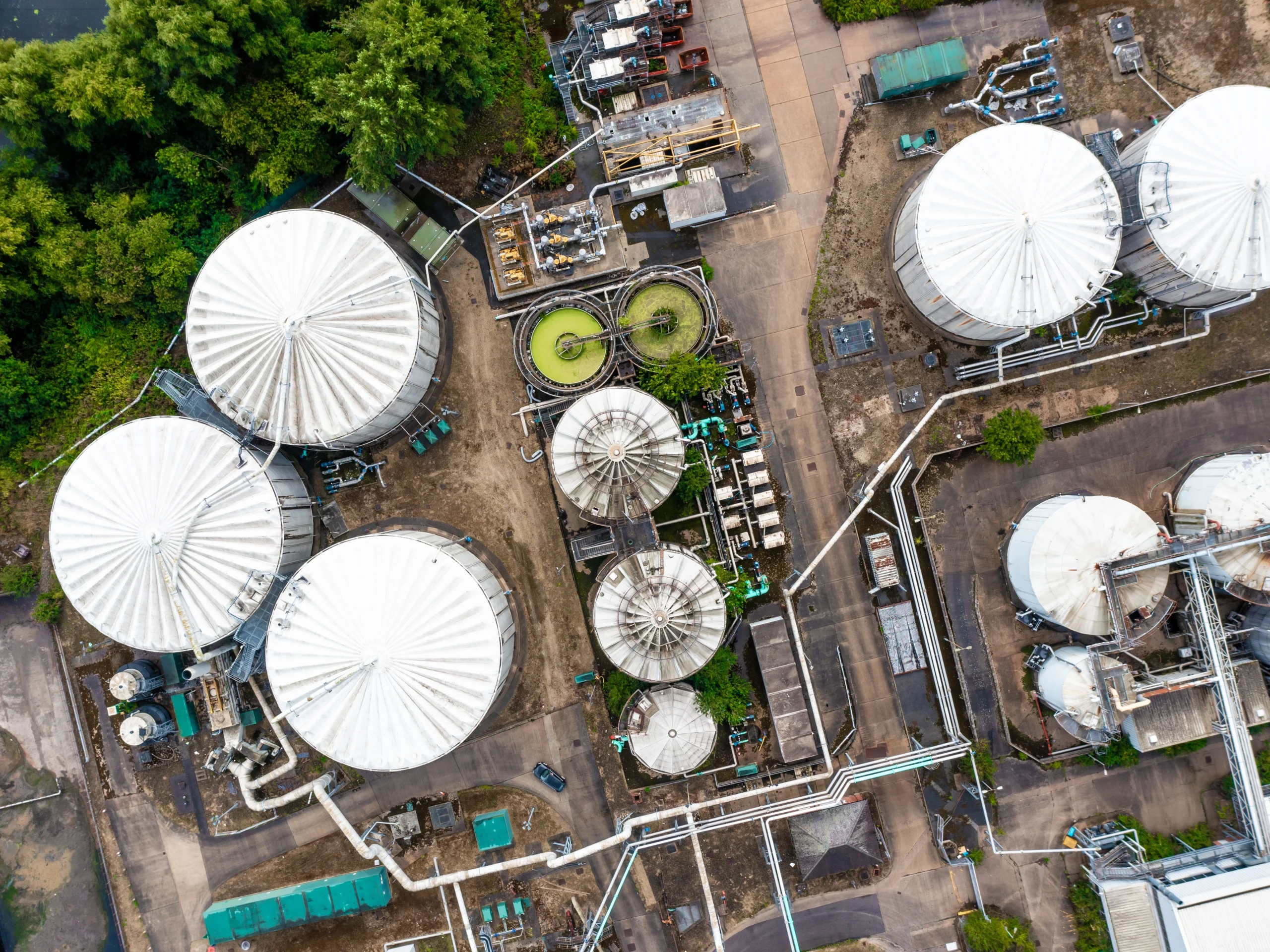 Aerial view of large chemical storage tanks