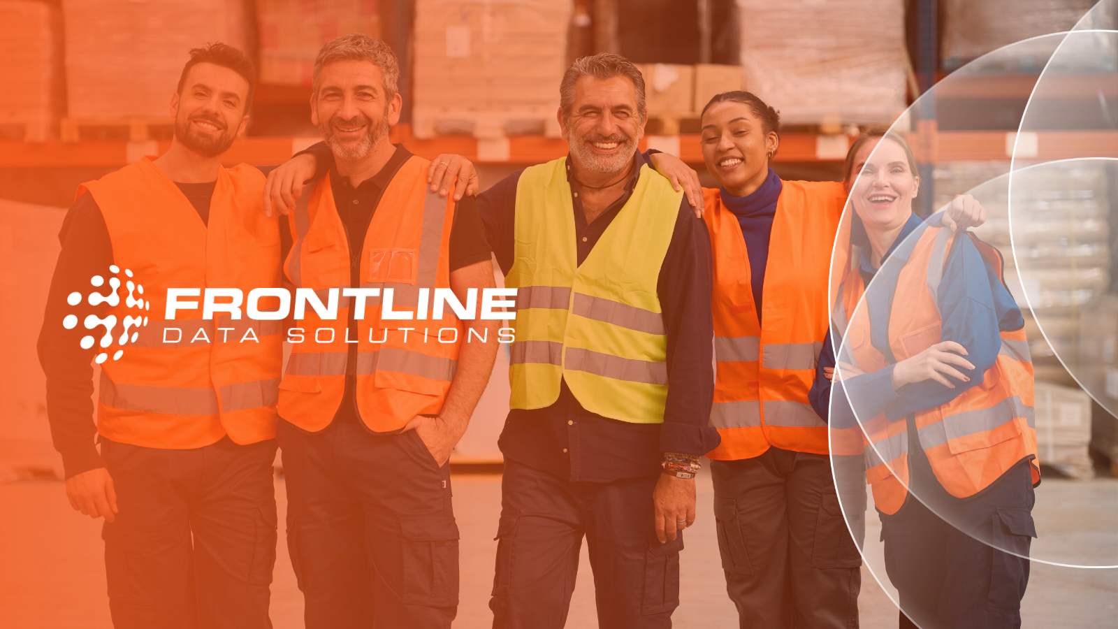 Team of smiling workers in high visibility vests showing the Frontline Data Solutions logo