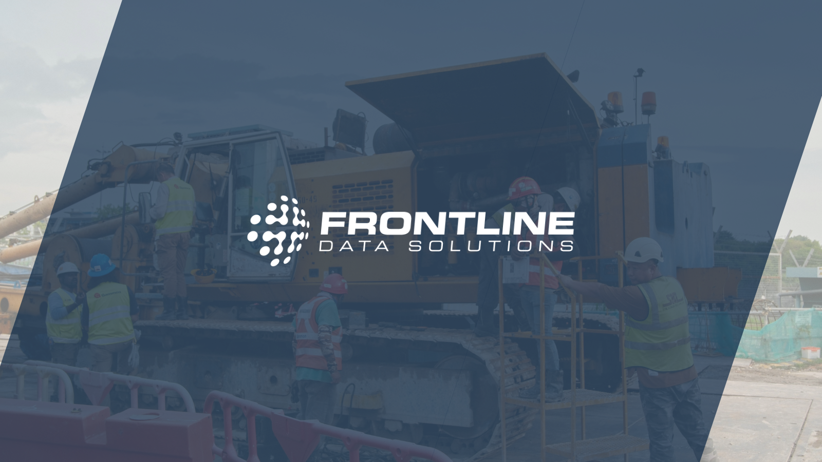 Portable equipment set up at construction site with the Frontline Data Solutions logo featured in the middle
